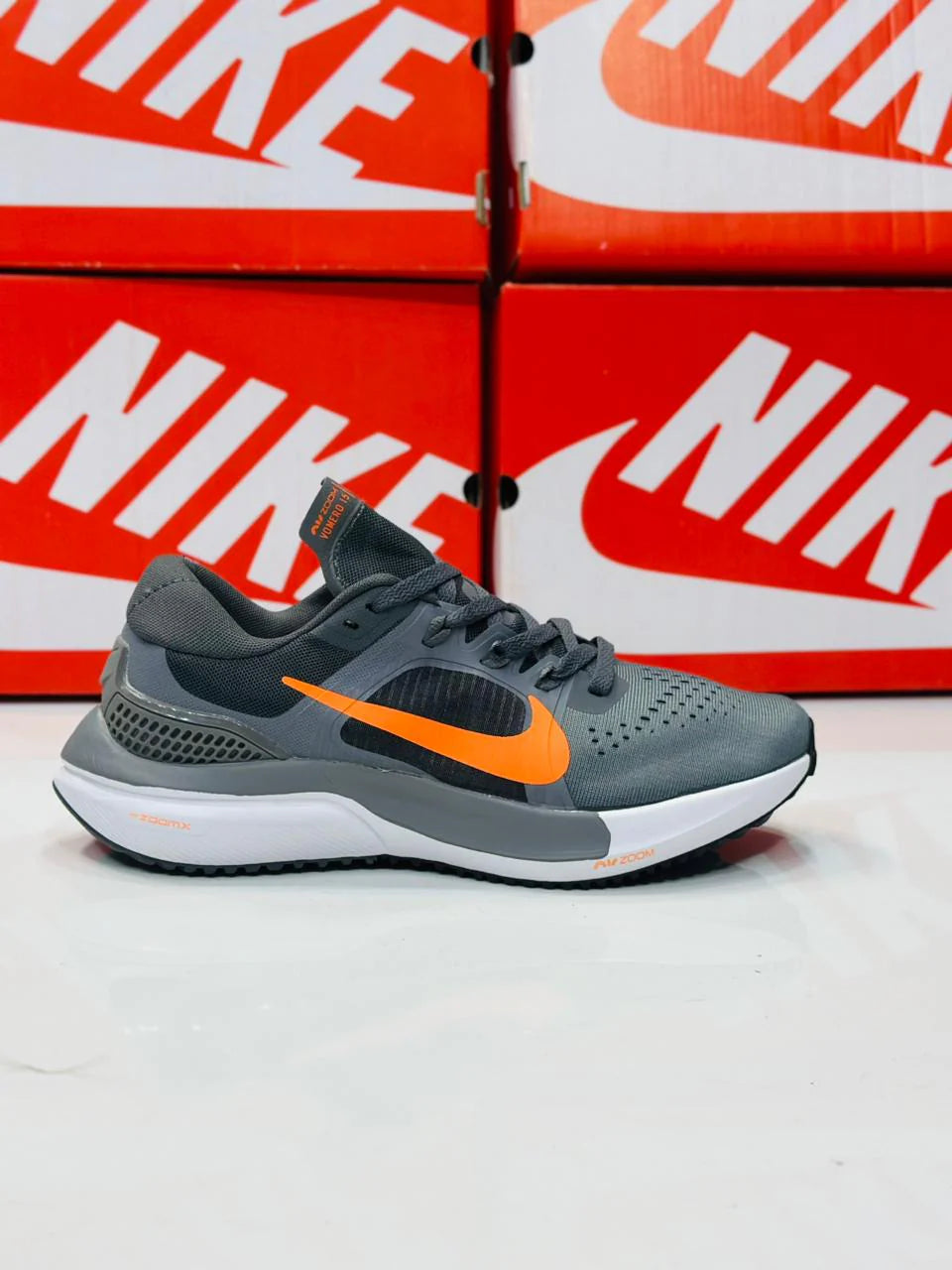 NIKE AIR ZOOM VOMERO 15 MULTI WOLF GREY BLACK AND ORANGE
